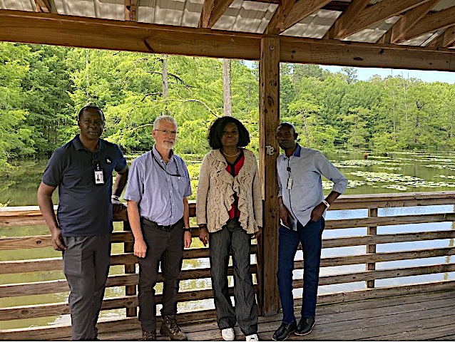 From left, Oluwasanmi Aina, Larry Hanson, Olanike Adeyemo, and Selim Alarape all went to Cypress Cove Boardwalk in Mississippi. (Photo by Mark Peterman)
