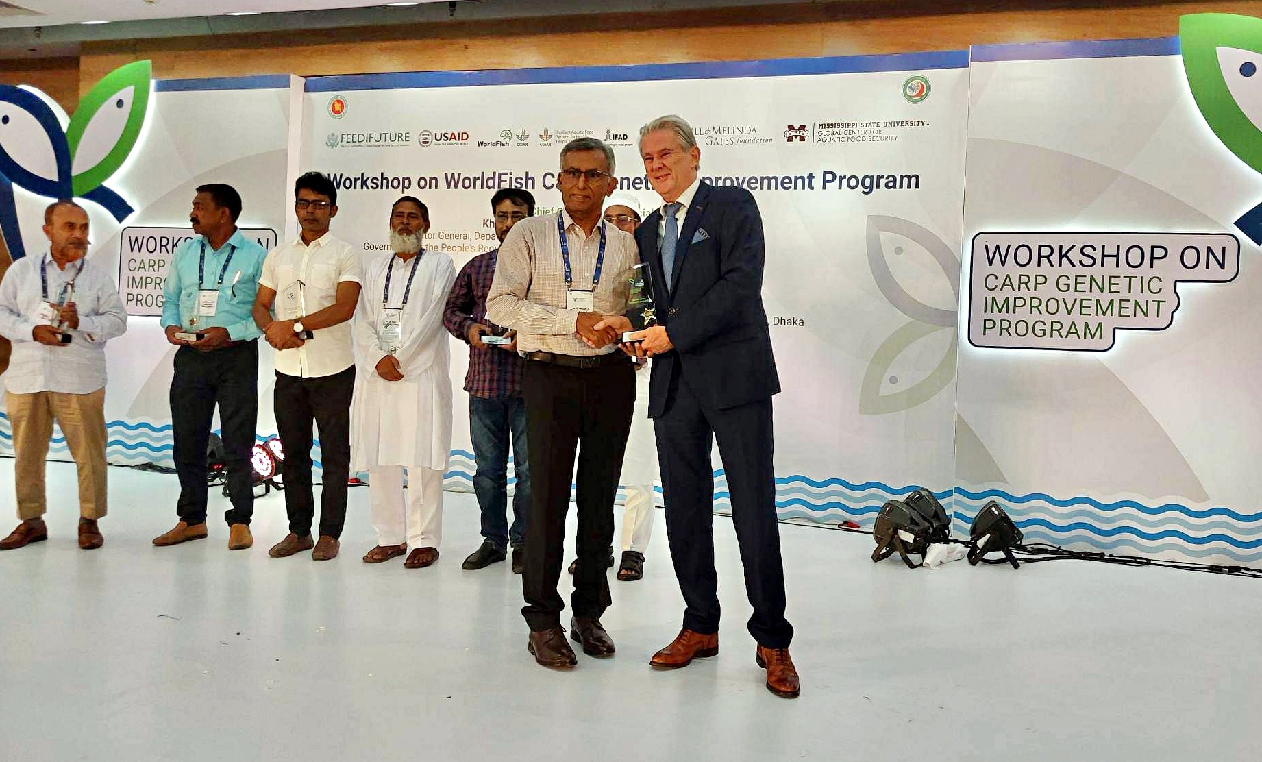 M. Gulam Hussain received an appreciation crest on behalf of the Fish Innovation Lab from Christopher Price. (Provided by M. Gulam Hussain)
