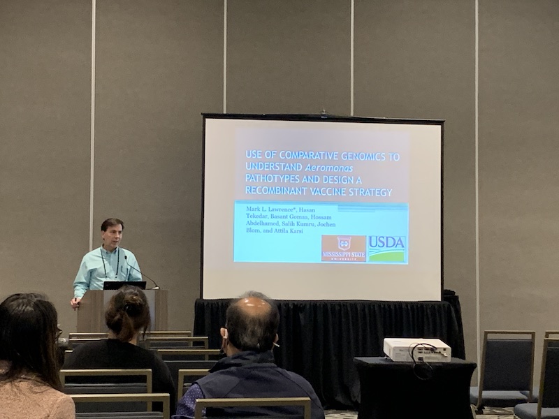 Mark Lawrence presenting during the panel on the “Use of Comparative Genomics to Understand Aeromonas Pathotypes and Design a Recombinant Vaccine Strategy”