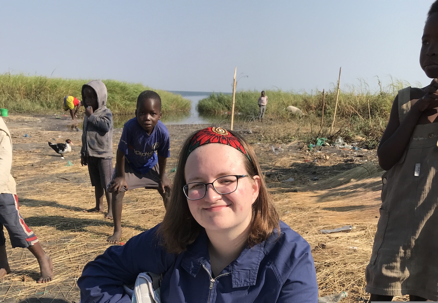 Laura Ingouf and children in fishing camp