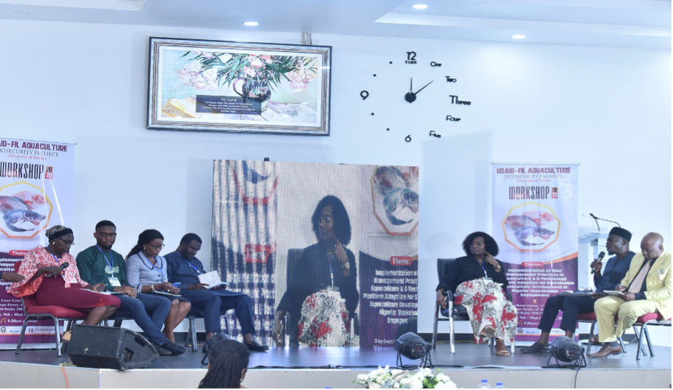 a panel session with four participants on stage